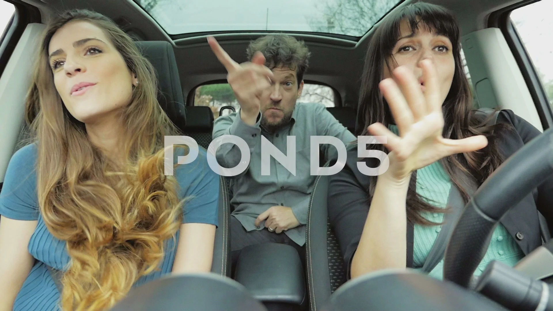 Very funny people in car doing jokes dan... | Stock Video | Pond5