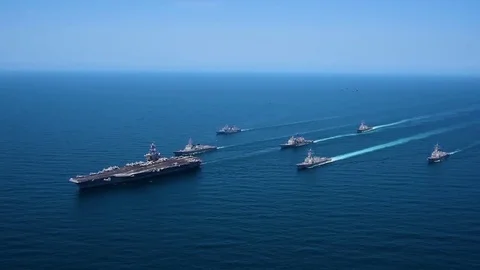 Very good aerial over a fleet of Amercian warships at sea. Stock Footage