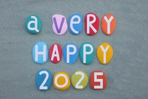 A very happy 2025 composed with multi colored stone letters Stock Photos