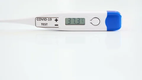 A very high temperature on the coronavirus or Covid-19 test thermometer Stock Footage 128709936