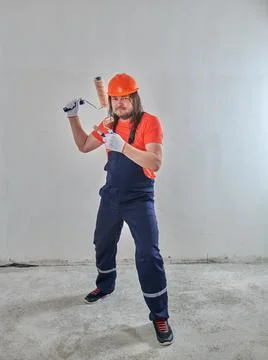 Very important painter with tools for renovating the apartment Stock Photos