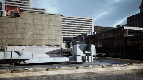 A very large building with some very tall buildings in the background Ilustração Stock