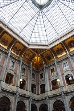 A very large open building with some windows and a skylight Fotos de archivo