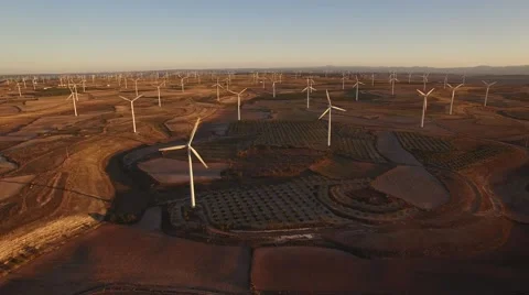 Very large wind turbines array at sunset Stock Footage 68403657