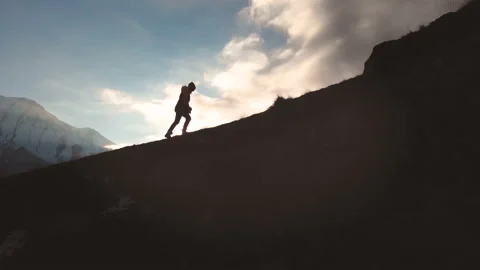 Very long shot Aerial view of epic shot of a girl walking on the edge of the Stock Footage 106214341
