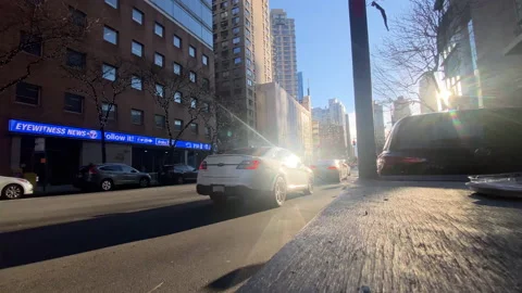 Very low angle timelapse of city traffic in Manhattan on a winter day Stock Footage 230730258