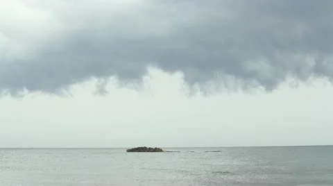 Very low menacing cloud over reef Stock Footage 11845817