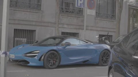 A very luxurious car on the side of the road in Madrid, Spain Stock-Footage 345028859