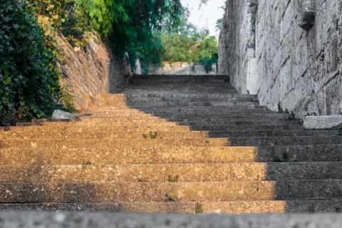 A very nice looking half colored half black and white stone stairs Stock Photos