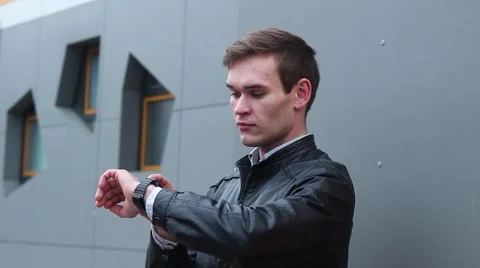 Very Nice Man Using Smart Watches. Stock-Footage 61179511