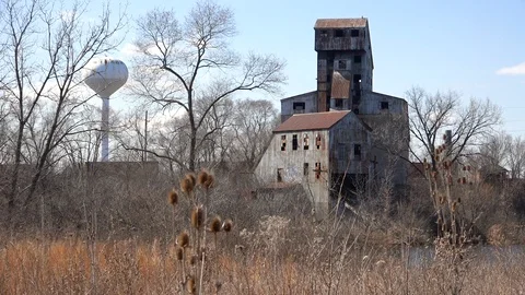 Very old abandoned rusting mill or factory suggests the end of America as an Stock Footage 107480505