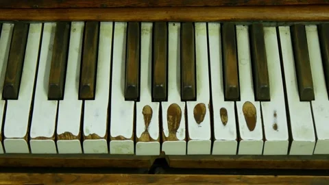 Very Old And Worn Keyboard Of Vintage Piano With Deep Abrasions From The Fingers Stock Footage 171656018