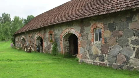 Very Old Barn Building Built of Huge Field Stones Stock Footage 257973047