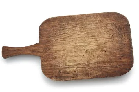 Very old brown rectangular wooden kitchen cutting board with handle Stock Photos