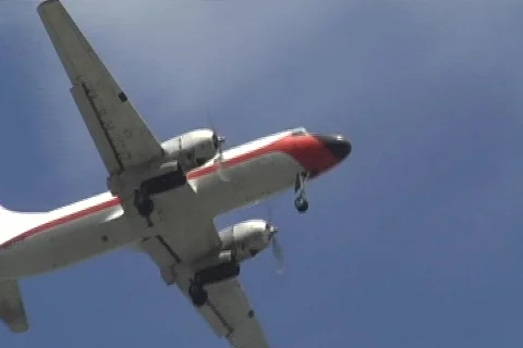 VERY OLD CARGO PROPELLER PLANE from below Stock Footage 877545
