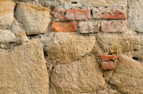 Very old downfallen brick wall of ancient building. Stock Photos