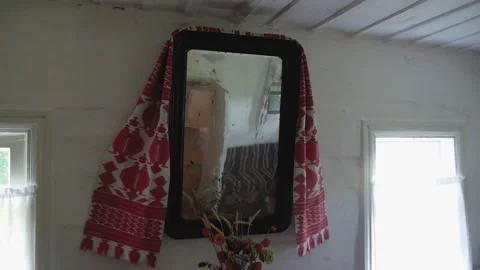 A Very Old Framed Wall Mirror Decorated With A Traditional Embroidered Cloth Stock Footage 227375602