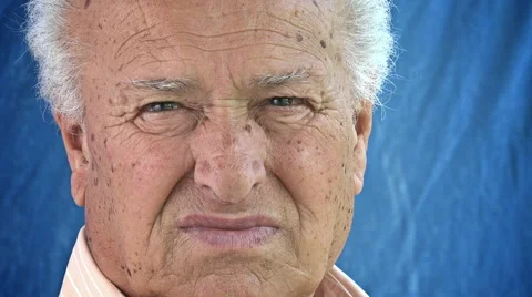 Very old man looking at the camera: pensive old man portrait Stock Footage 64214530