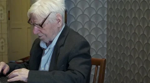 Very old man working on computer Stock Footage 46503448
