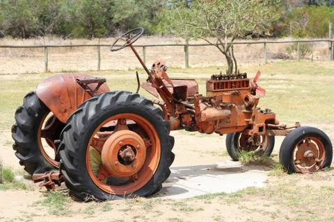Very old red tractor Stock Photos