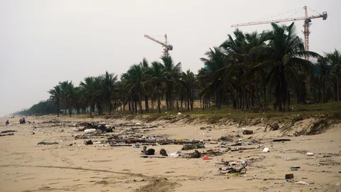 Very polluted beach full of trash, plastic bottles and garbage. Video stock 126291906