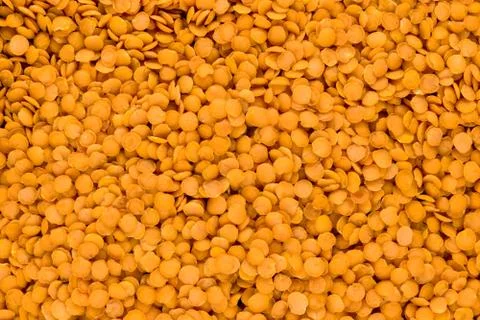 Very Sharp and Clear Background Surface of Red Lentil Grains Foto stock