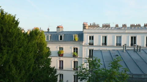 A very slow camera tilt up showcasing the elegant white facades, zinc rooftops,  Stock Footage 337414234