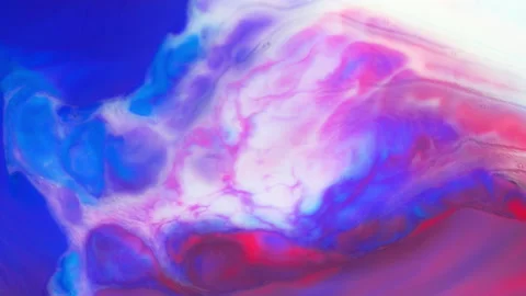 Very slow motion of white red blue explosion Stock Footage 227859219