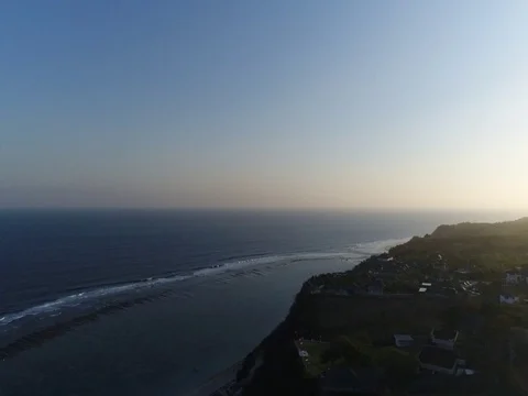 Very slow pan out over beach and ocean in Bali Indonesia. Stock Footage 80175774