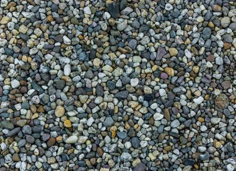 Very small and tiny pebble stone rocks in macro close up in diverse colors ga Stock Photos
