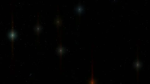 Very small stars surround distant stars, the light from which barely breaks Stock Footage 162120220