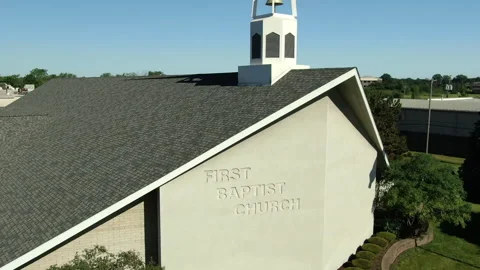 Very smooth craning backward establishing drone shot of First Baptist Church Stock Footage 209290427