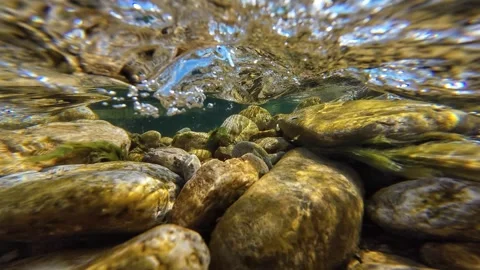Very strong rapid crystal river water flows underwater footage natural sound Stock Footage 342823160