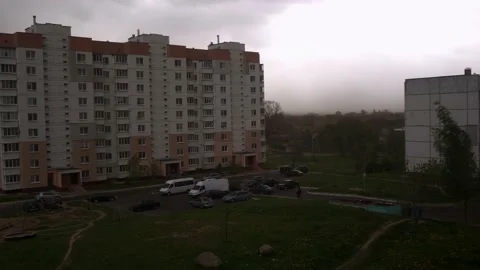 Very strong wind in the city in the yard, deterioration of the weather Stock Footage 208052502