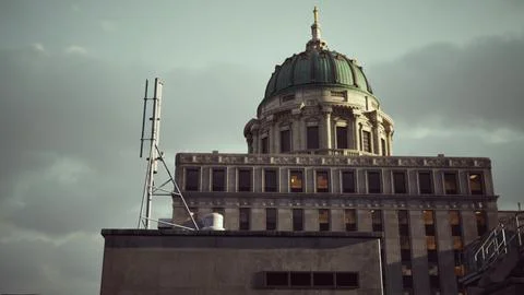 A very tall building with a clock on the top of it Ilustração Stock
