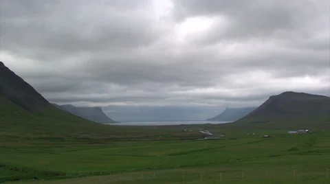 Very wide U-shaped valley and fjord with timelapse clouds Stock Footage 37272128