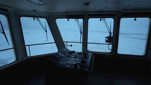 Vessel. Control panel on wing of navigation bridge. Frozen sea outside. Big Stock Footage 243385673