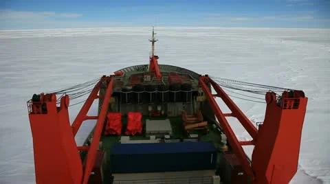 The vessel goes thru ice fields in Antarctic Stock Footage 10818534