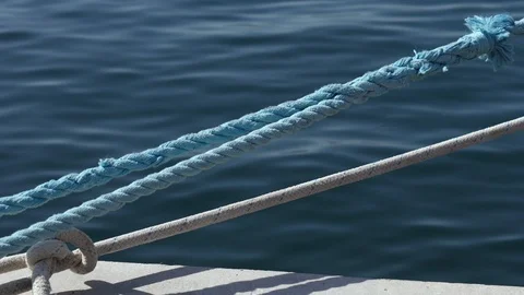 Vessel mooring lines attached to the dock. Close up. Marina port Stock Footage 118843671
