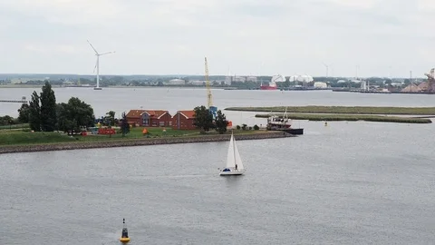 Vessel navigating along the coast Stock Footage 70578592