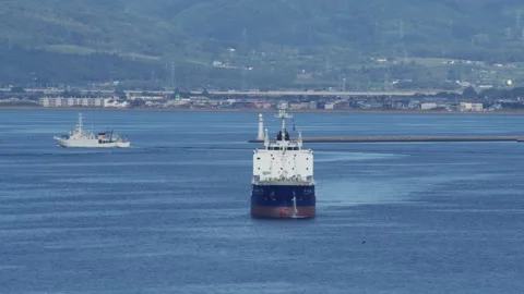 Vessel navigating open waters near the coastline, Hakodate, Japan, 2026.09.10. 動画素材 345434041
