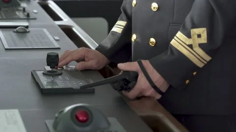 Vessel Navigation bridge inside. Officer at control panel. Mate with portable Stock Footage 223760761