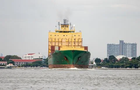 The Vessel Type Container Ship sails from the Chao Phraya River, Thailand Stock Photos