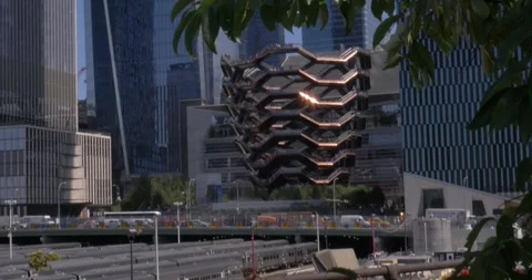 The Vessel Viewed Through Shrubs on the High Line in Hudson Yards Manhattan NYC Stock Footage 246573949