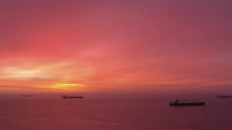 Vessels on raid. Red fiery sunset. Aerial view Stock Footage 266522882