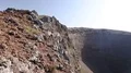 Vesuvius with rocky slopes and cauldron-like crater shown from above, sequence HD Footage