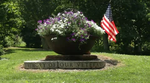 Veteran Monument with flag Stock Footage 18156384