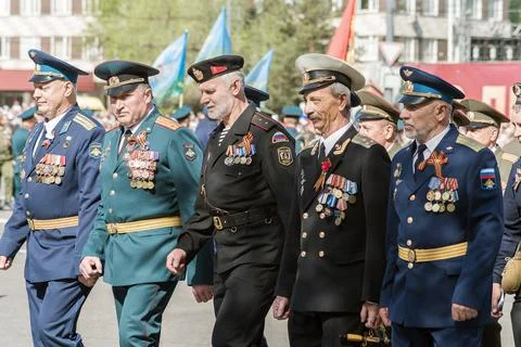 Veterans of different types of troops, in the parade Stock Photos