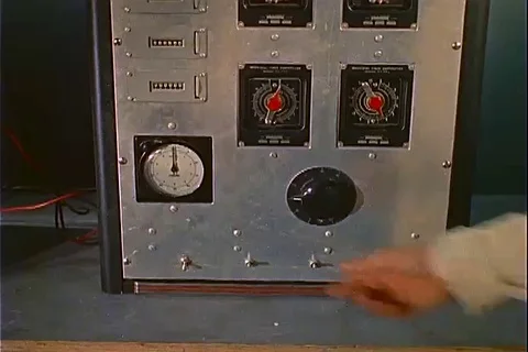 Veterinarian operates control machine during test at Randolph AFB - 1959 Stock Footage 104652717