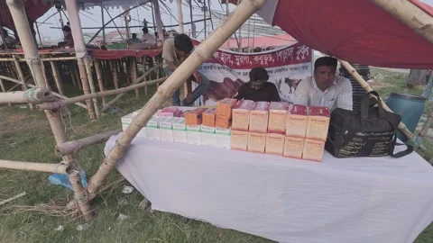 Veterinary Medicine Shop at Eid Cattle Market Entrance in Uttara Diyabari Stock Footage 335367112